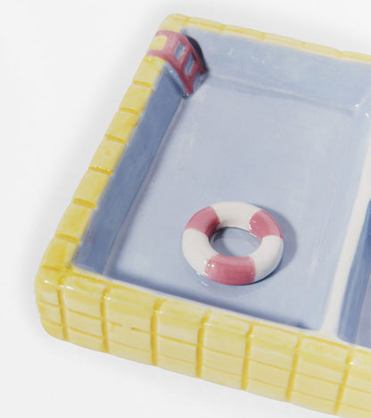 Repose-bijoux piscine