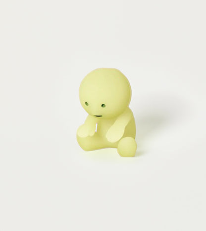 Figurine fluorescente Smiski - série Exercising 